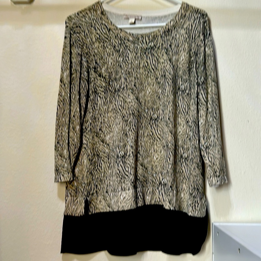 Tan and Black animal print top. 82% Viscose, 18% Nylon